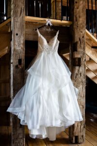 Designer wedding dress is displayed on wedding day at a beautiful countryside wedding venue near Ann Arbor Michigan