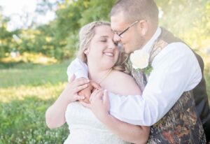 Bride and groom enjoying golden hour at their garden wedding venue near Ann Arbor
